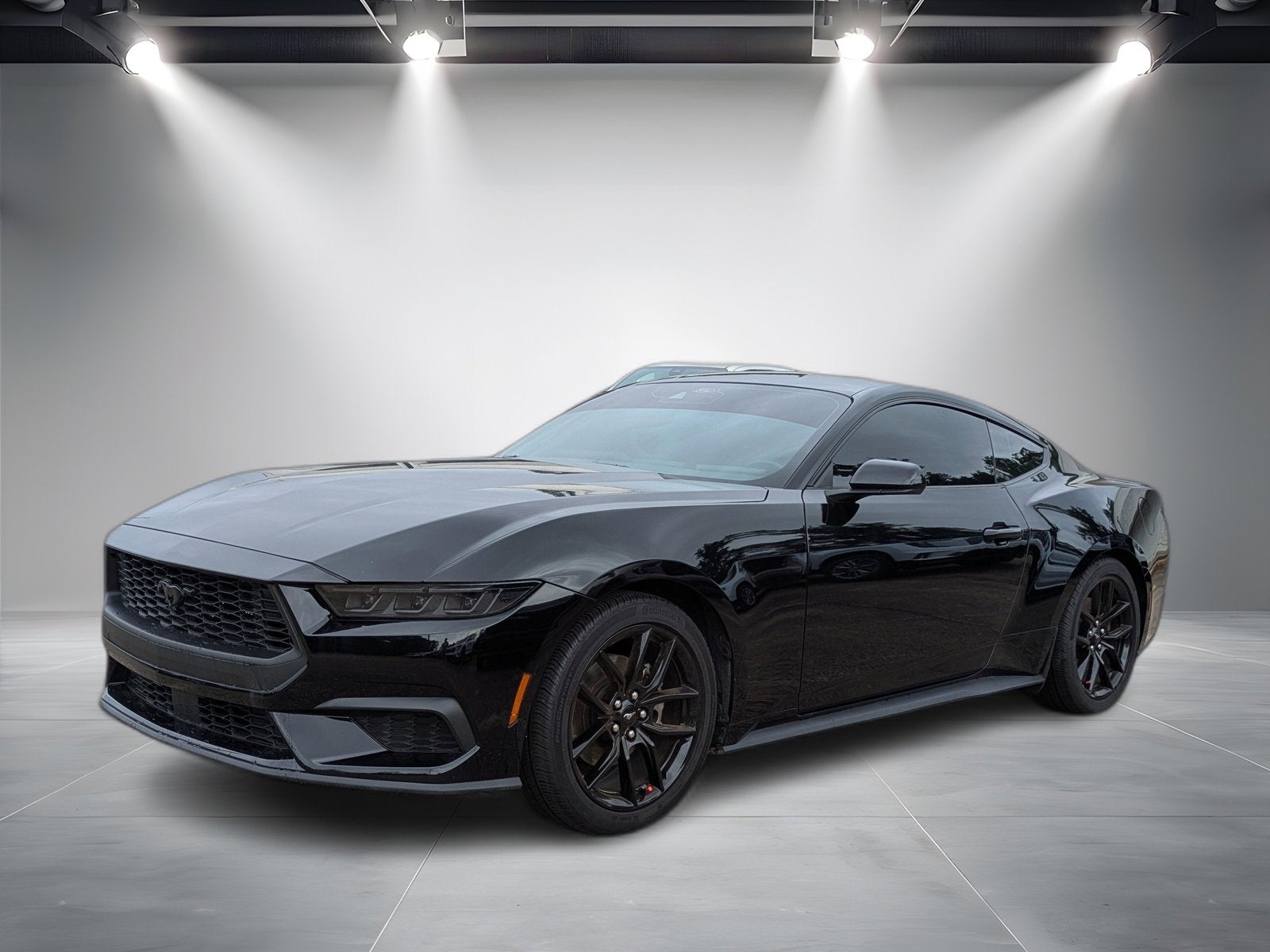 2025 Ford Mustang EcoBoost Fastback in Black — front three-quarter view