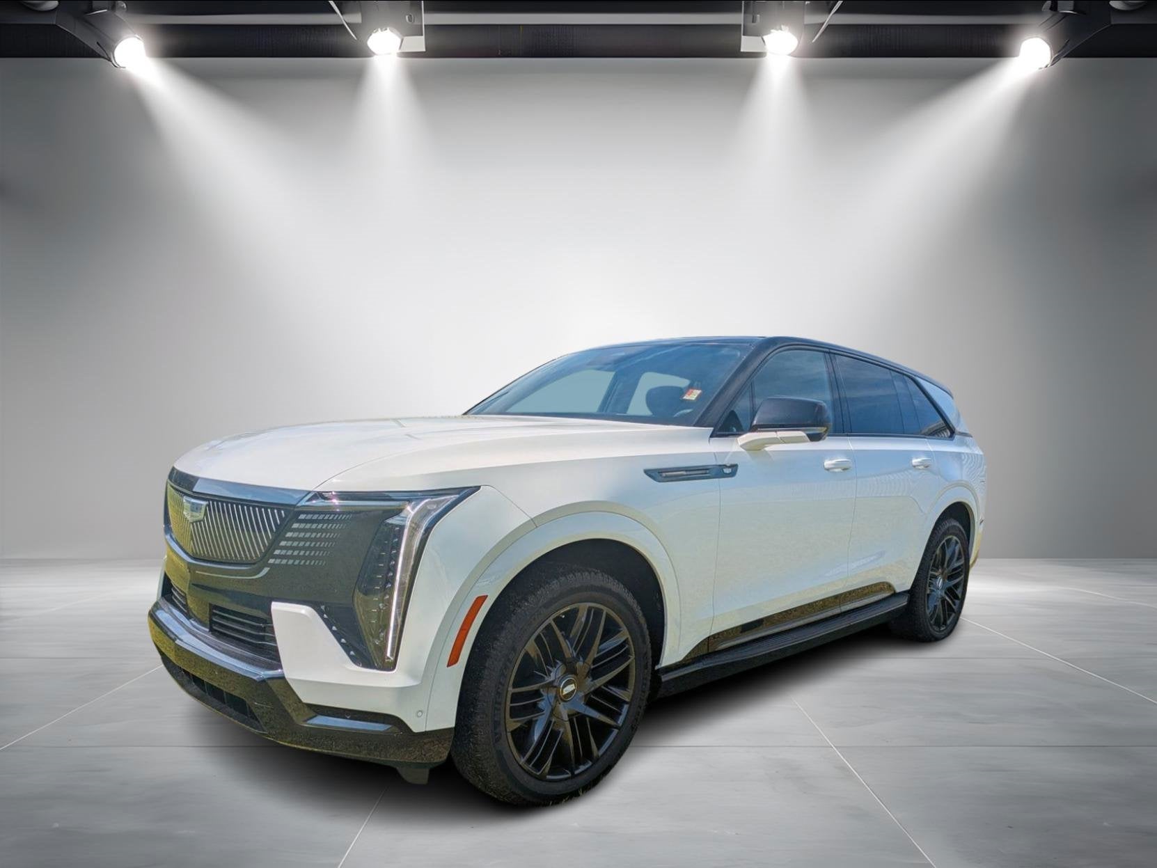 2025 Cadillac ESCALADE IQ Sport 1 in Summit White — front three-quarter view