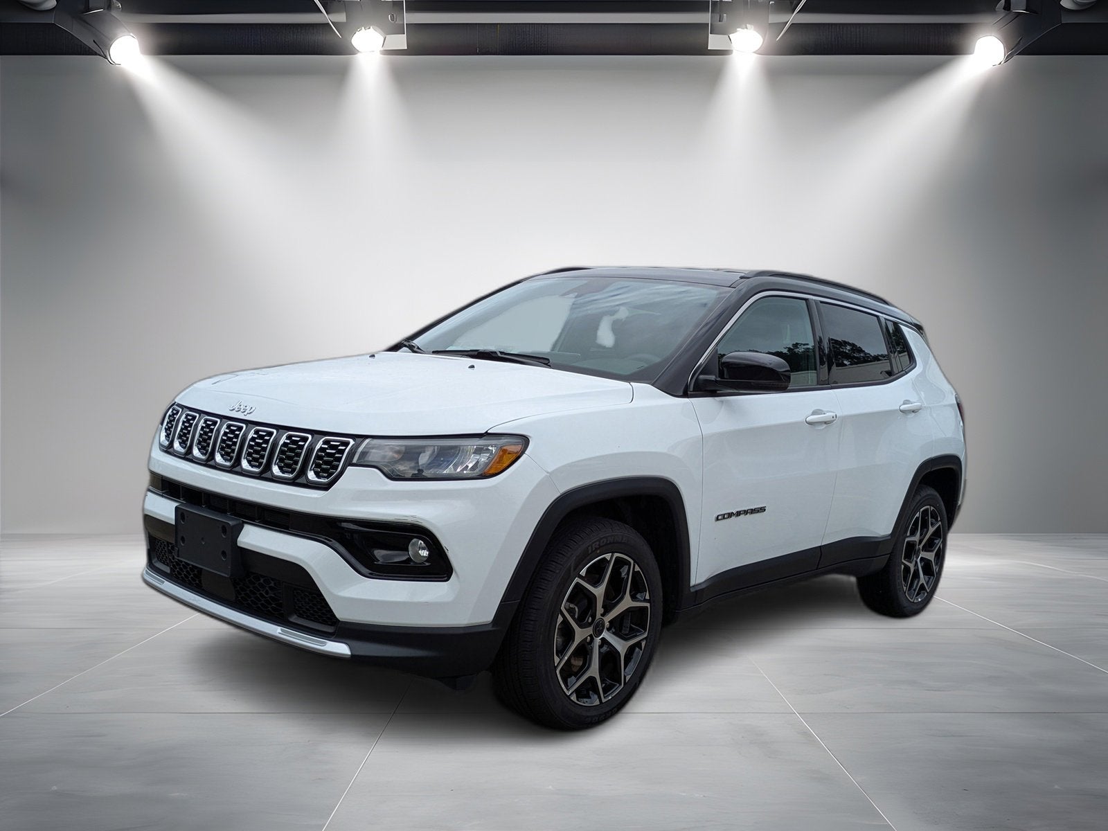 2025 Jeep Compass Limited 4x4 in White — front three-quarter view
